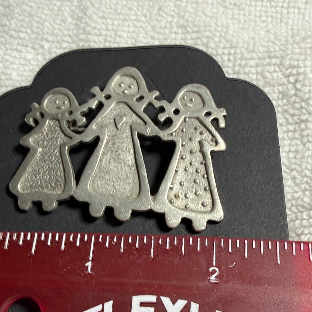 C. Webb Silver-Tone Three Girls Holding Hands Brooch
